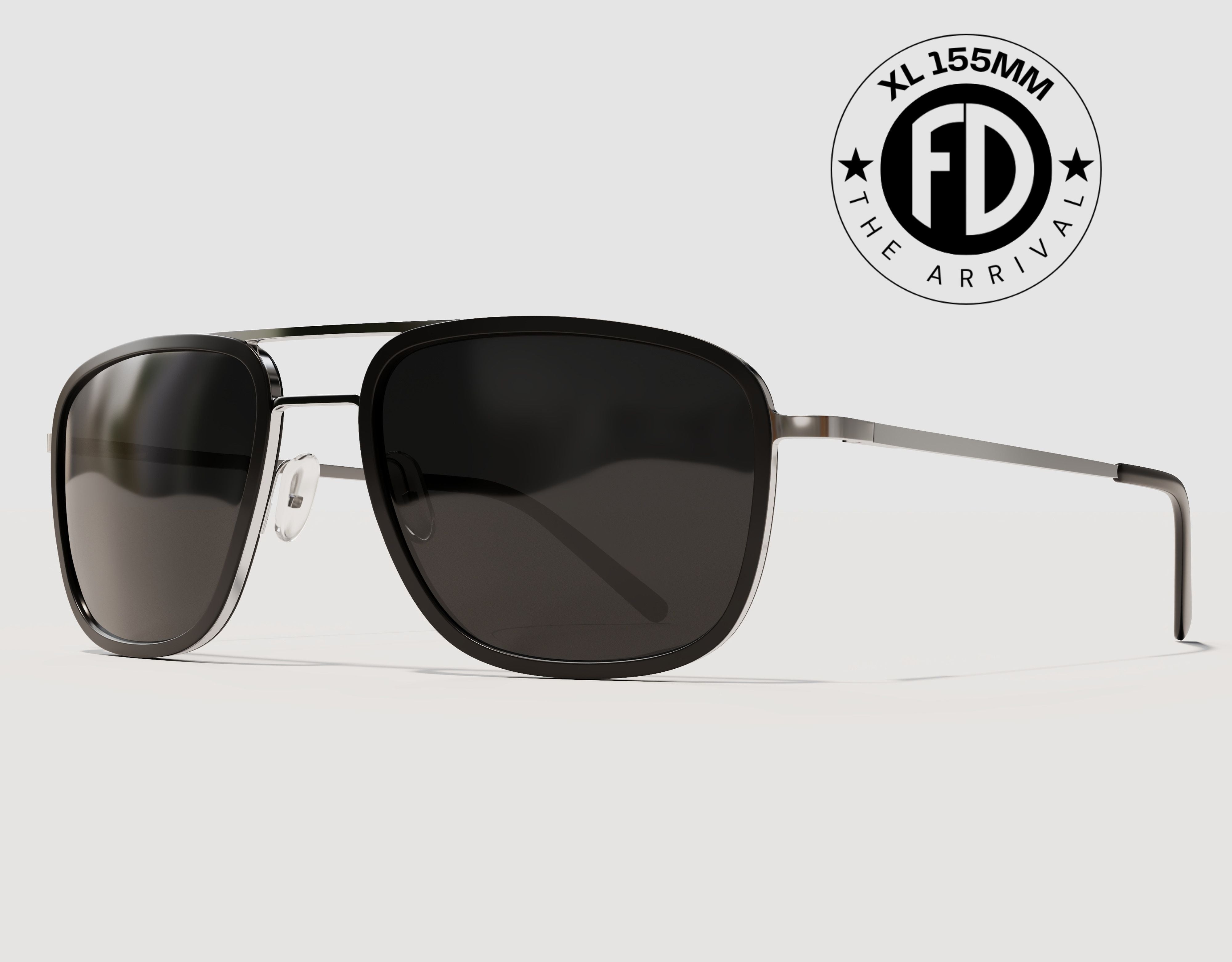 The Arrival 155mm XL premium aviator-style sunglasses in Black and Chrome with black smoke polarised lenses – lightweight wide-fit frame with adjustable nose pads.