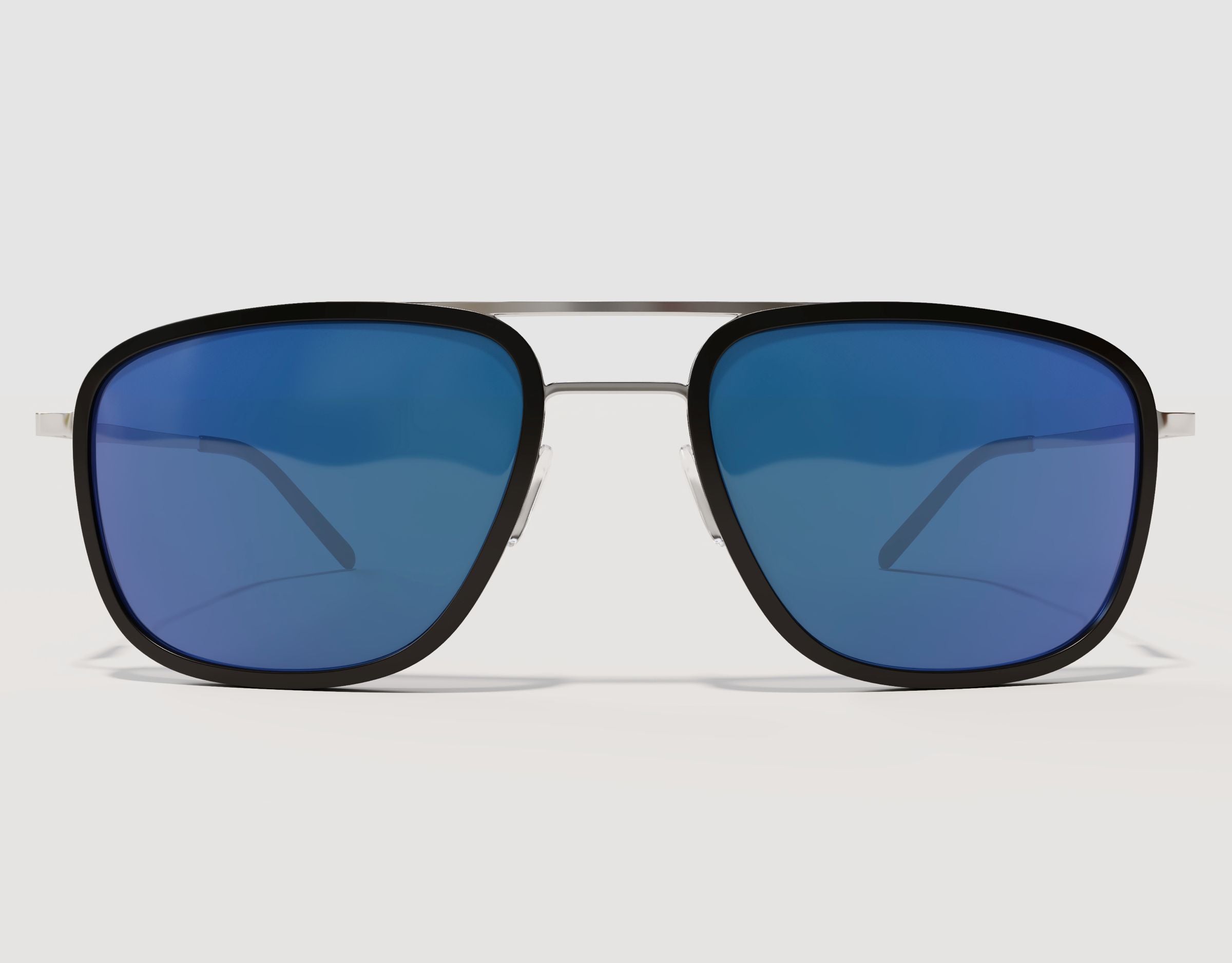 Front view of The Arrival 155mm XL premium wide-fit sunglasses in Black and Chrome with Blue Ice lenses – adjustable nose pads and hybrid construction.