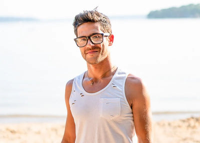 Model wearing 145mm Large Classic blue light blocking glasses in Black Matte, offering a modern oversized fit for stylish digital eye protection.
