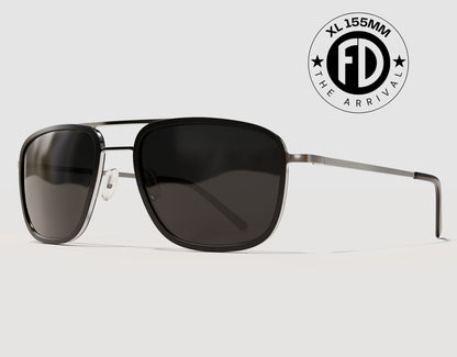 The Arrival 155mm XL premium aviator-style sunglasses in Black and Chrome with black smoke polarised lenses – lightweight wide-fit frame with adjustable nose pads.