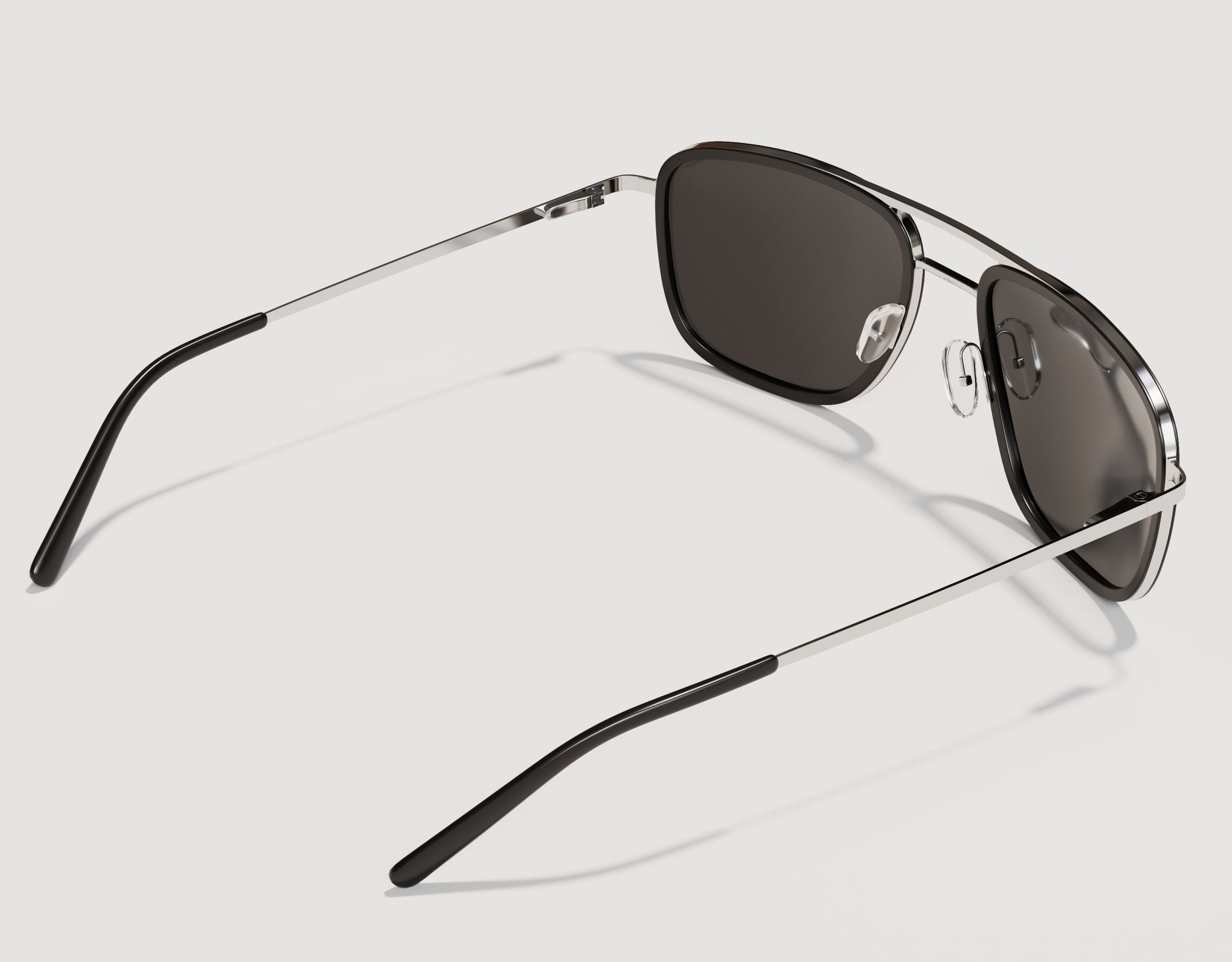 Rear view of The Arrival 155mm XL sunglasses in Black and Chrome with Blue Ice polarised lenses – comfortable wide fit designed for larger heads.