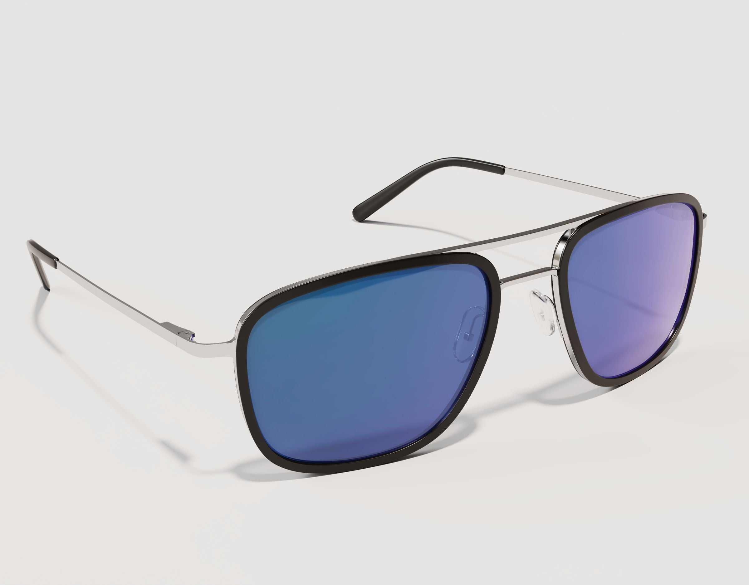 Side profile of The Arrival 155mm XL aviator-style sunglasses in Black and Chrome with Blue Ice lenses showing lightweight metal detailing.