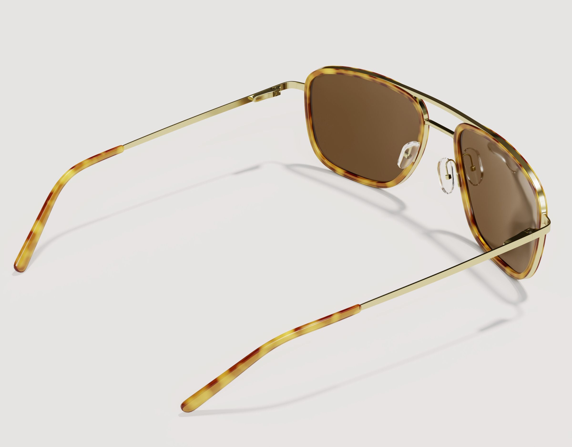 Rear view of The Arrival 155mm XL aviator-style sunglasses in Tortoise and Gold – wide-fit arms and adjustable nose pads for lasting comfort.