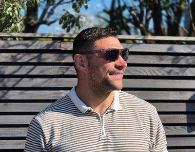 Model wearing Sport 155mm XL sunglasses in Slate Grey – polarised sport shades designed for round faces and large heads.
