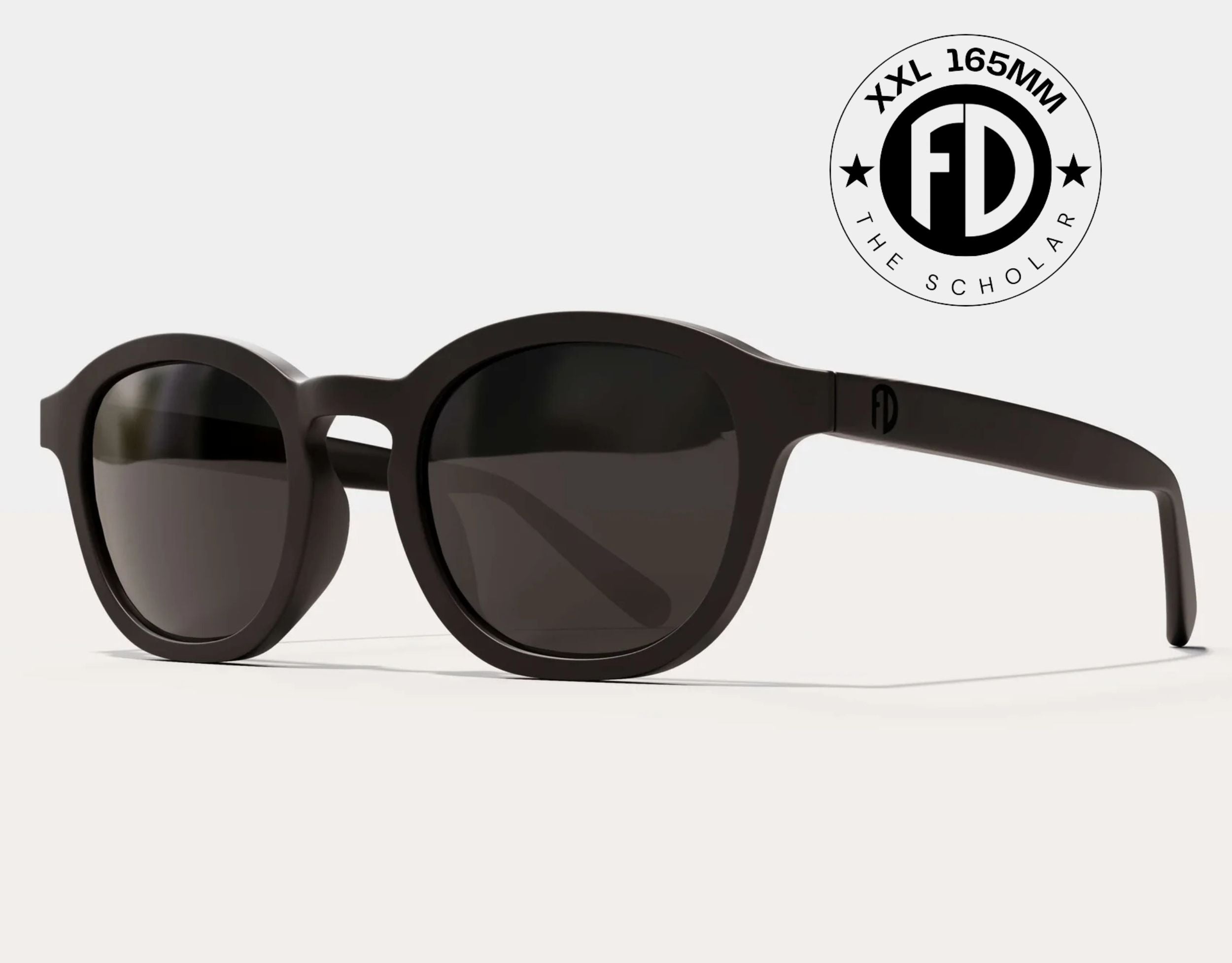 The Scholar 165mm XXL large frame sunglasses in Blackout with black polarised lenses and a cool black logo– extra wide fit for large heads and broad faces.
