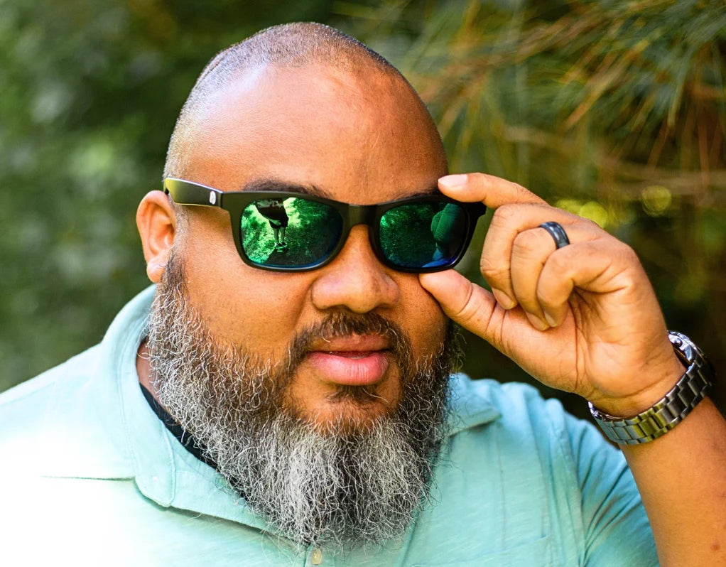 Model wearing The Gent 165mm XXL sunglasses for wide faces in Black with green lenses – polarised, extra large, and built for wide heads.