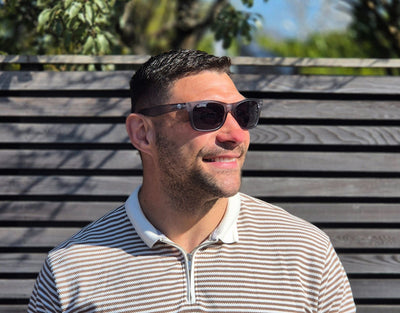 Model wearing The Gent 165mm XXL wide sunglasses in Grey Slate – stylish polarised sunglasses for guys with large heads.