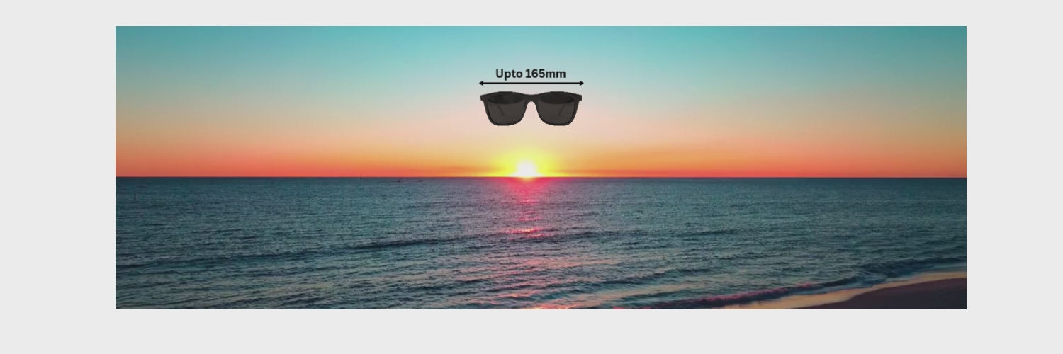 Load video: Panning shot of a sunset over the ocean